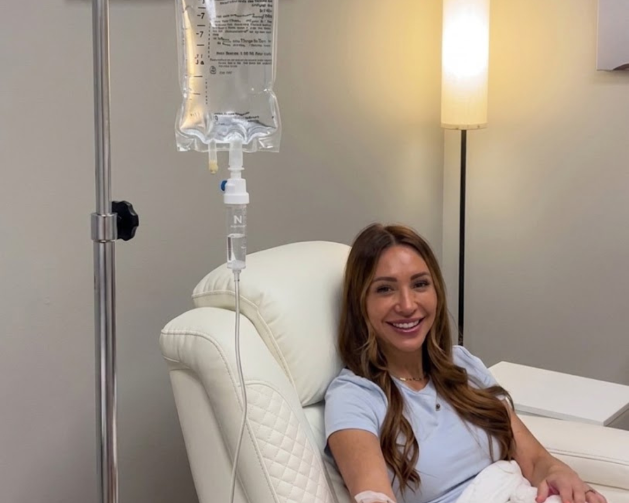 Client relaxing during an IV infusion at Woodlands Natural Health in The Woodlands, TX